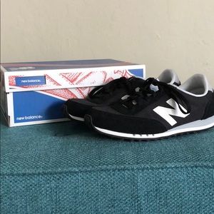 Black and white New Balance sneakers